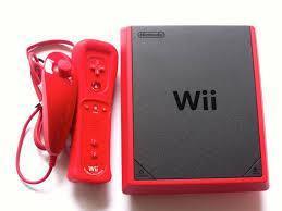 Consola. Wii con 5 jurgos