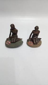Figuras Mujer sobre Piedra Dinamarca