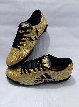 Zapatillas fútbol o sintética. Adidas dorado .000