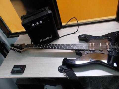 guitarra eléctrica IBANEZ ,amplificador,linea y afinador electrico