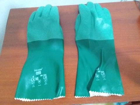 Un par de Guantes marca SCORPIO Ansell color verde Ref. 08-354