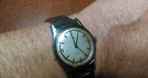 vendo o cambio excelente reloj de colección ., UNIVERSAL ., de cuerda