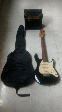 Guitarra peavey raptor exp y amplificador fretmaster 15 watts