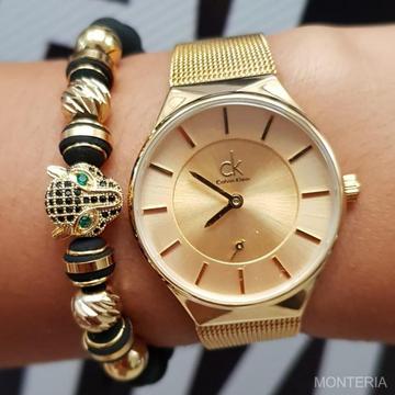 Reloj Calvin Klein dorado fondo dorado a la venta para dama